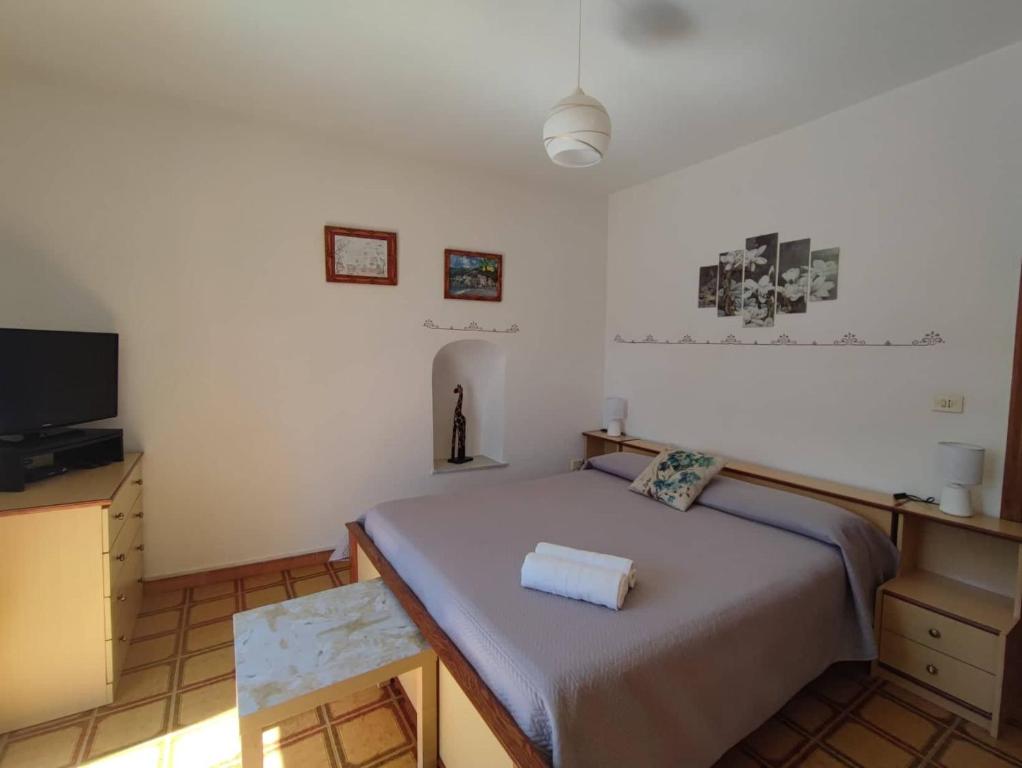 Łóżko lub łóżka w pokoju w obiekcie Villa Marietta