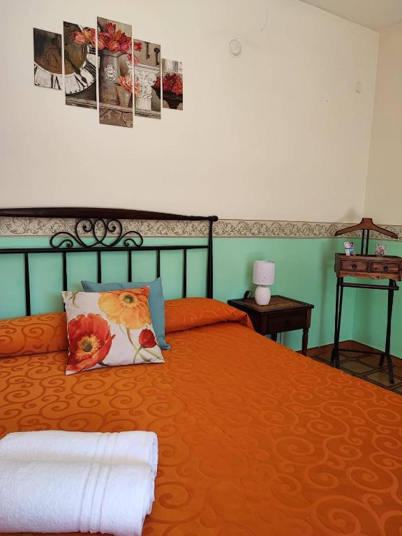 Łóżko lub łóżka w pokoju w obiekcie Villa Marietta
