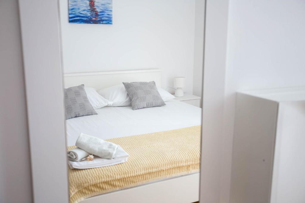 Postel nebo postele na pokoji v ubytování Villa Silvana