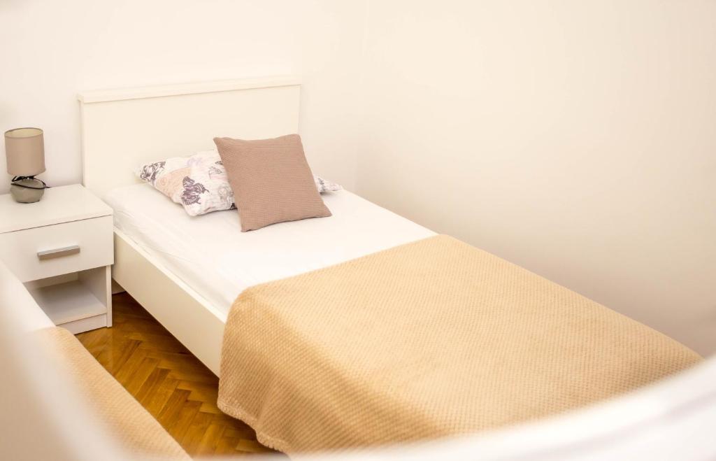 Postel nebo postele na pokoji v ubytování Villa Silvana