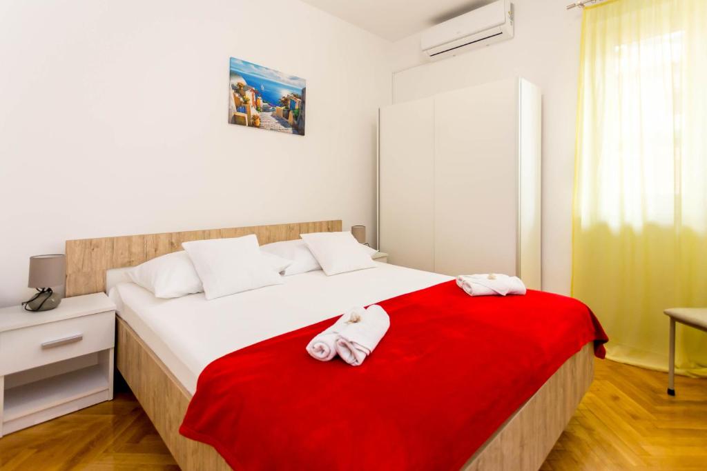 Postel nebo postele na pokoji v ubytování Villa Silvana