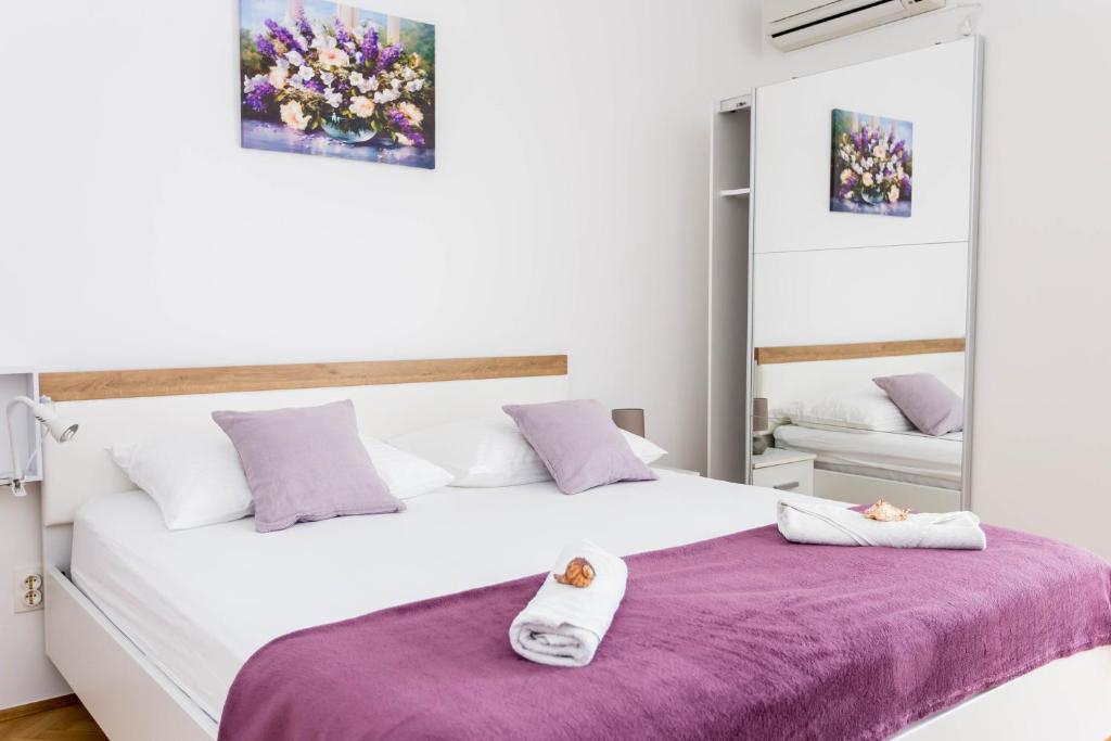 Postel nebo postele na pokoji v ubytování Villa Silvana