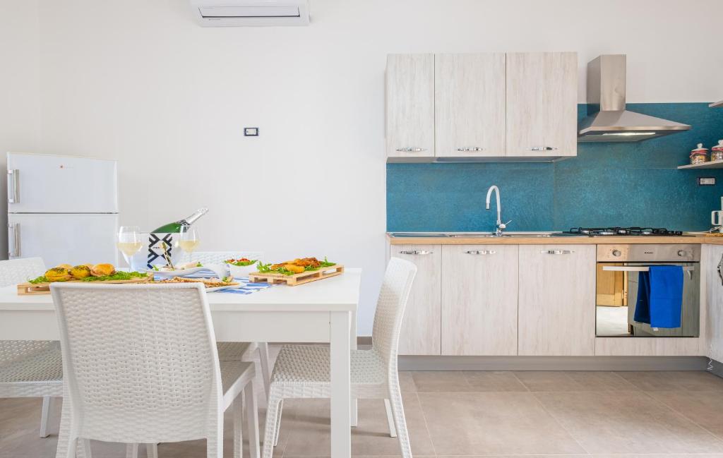 Kuchyň nebo kuchyňský kout v ubytování Apartment Mikao - Torre Pali