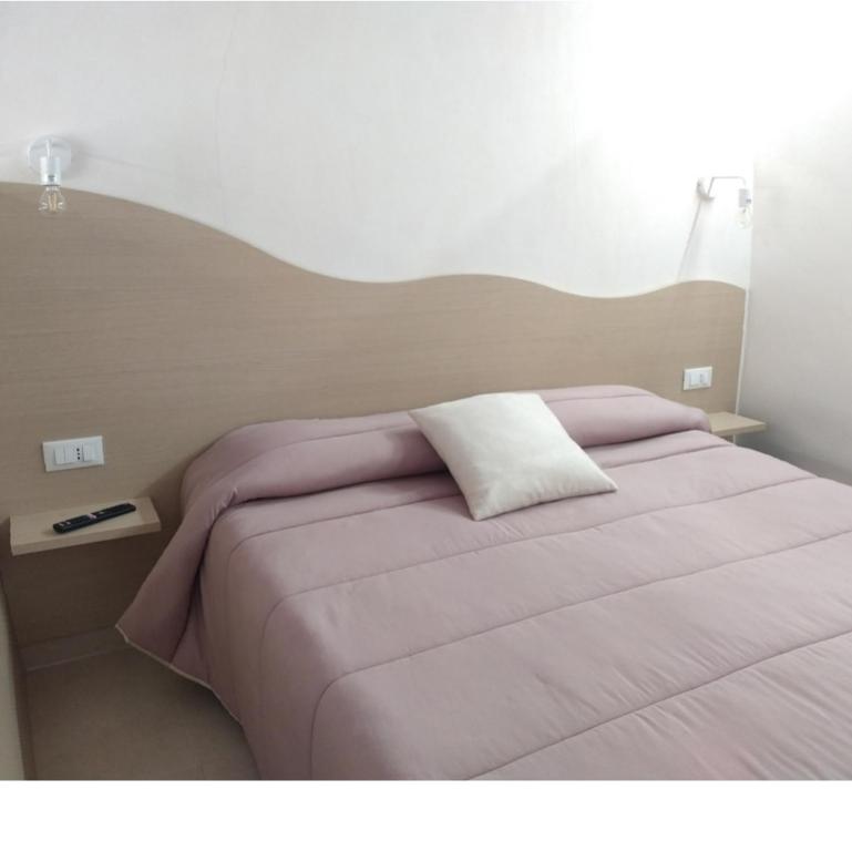 Posteľ alebo postele v izbe v ubytovaní Casa Sole Mare
