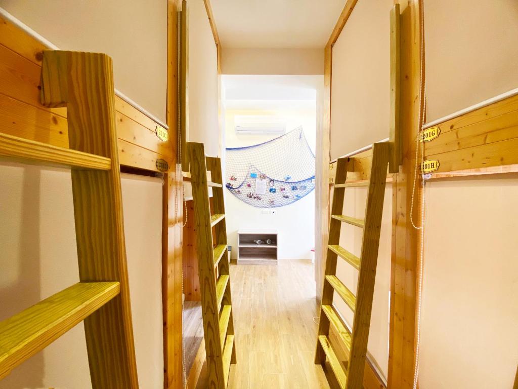 Postel nebo postele na pokoji v ubytování Hello Inn