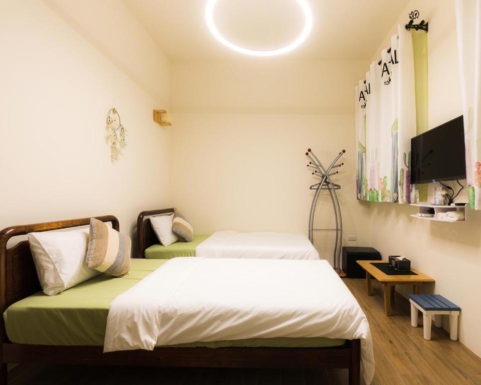 Postel nebo postele na pokoji v ubytování Hello Inn