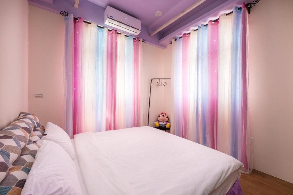 Postel nebo postele na pokoji v ubytování Hello Inn