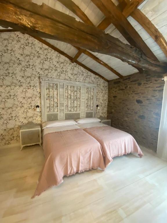 Postel nebo postele na pokoji v ubytování Casa Meiga
