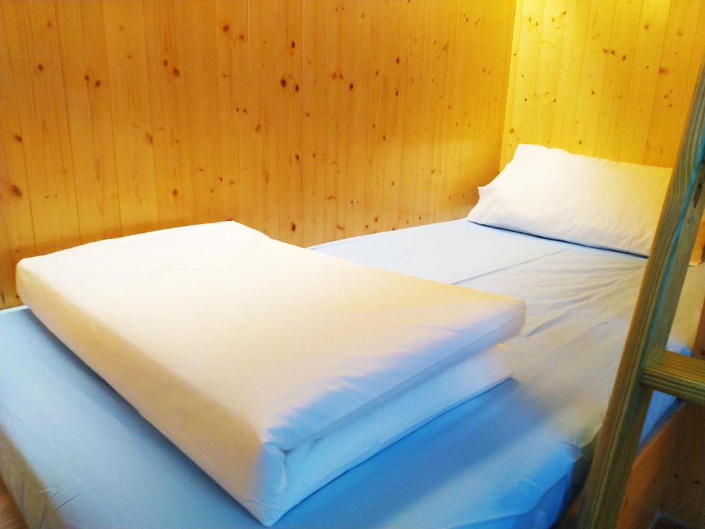 Postel nebo postele na pokoji v ubytování Hello Inn