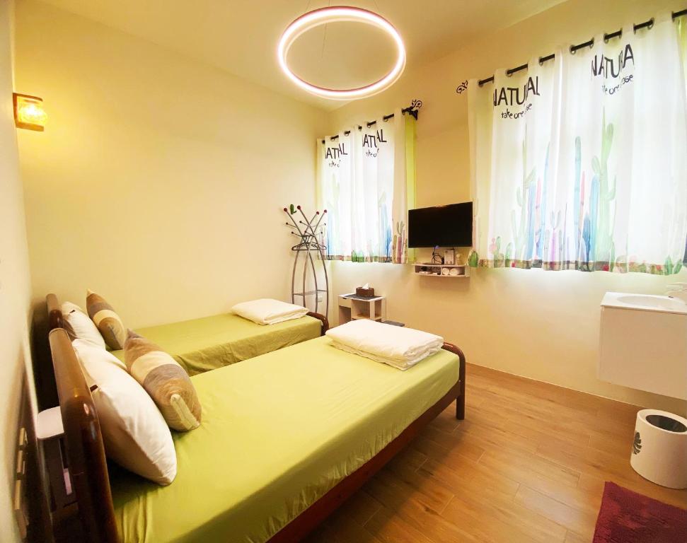Postel nebo postele na pokoji v ubytování Hello Inn