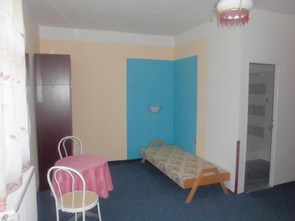 Postel nebo postele na pokoji v ubytování Penzion Laguna