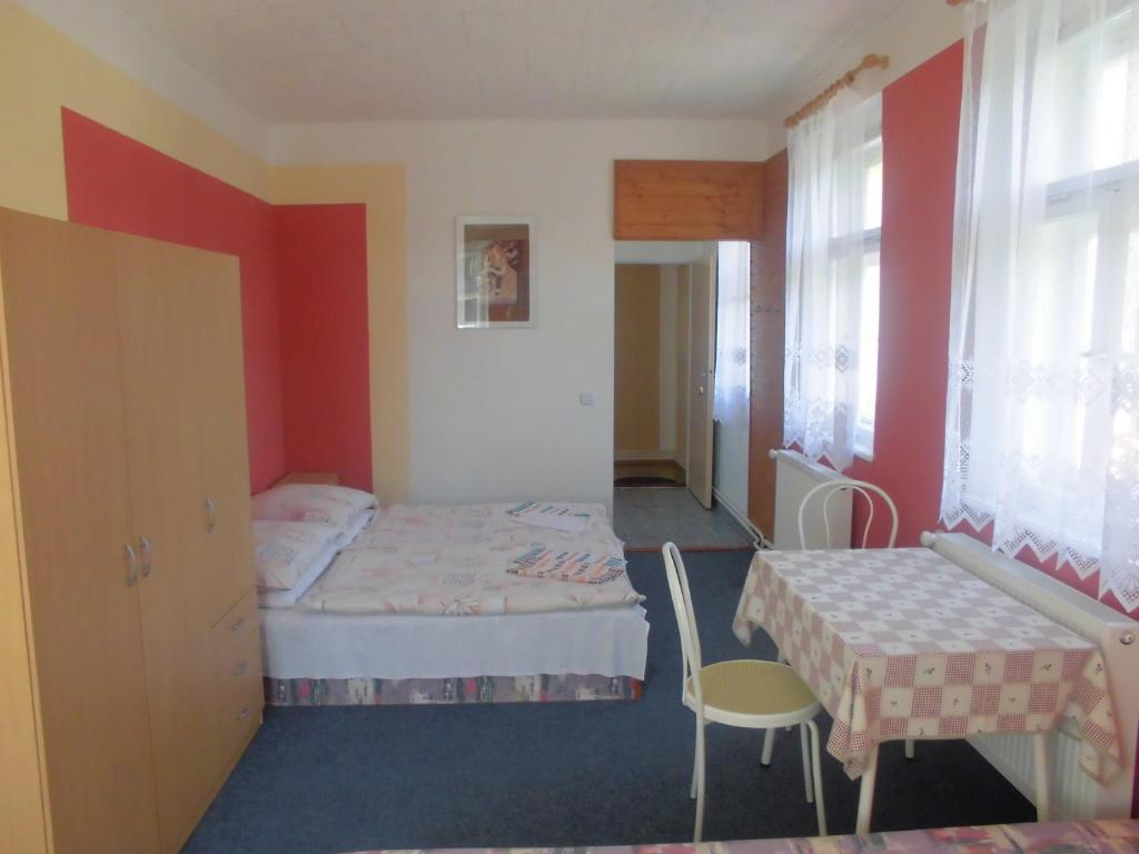 Postel nebo postele na pokoji v ubytování Penzion Laguna