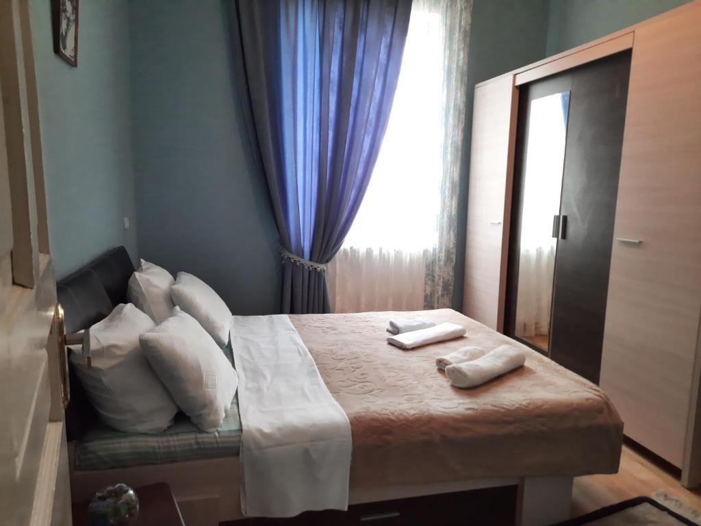 Postel nebo postele na pokoji v ubytování Sisi Guest House