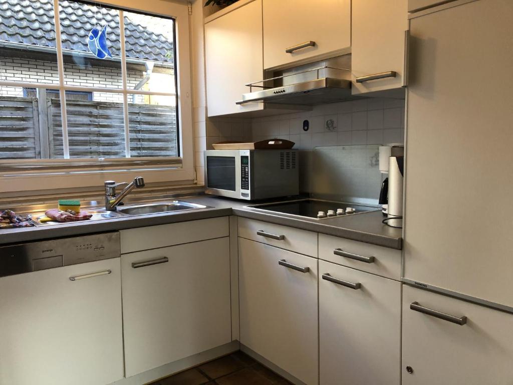 Kuchyň nebo kuchyňský kout v ubytování Blaue Oase Ferienhaus