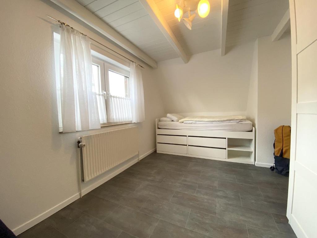 Postel nebo postele na pokoji v ubytování Blaue Oase Ferienhaus