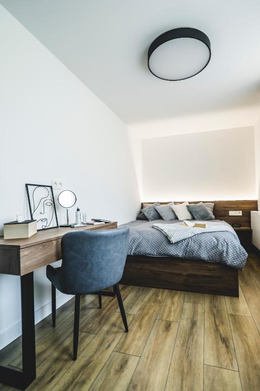 Postel nebo postele na pokoji v ubytování beauty bar concept