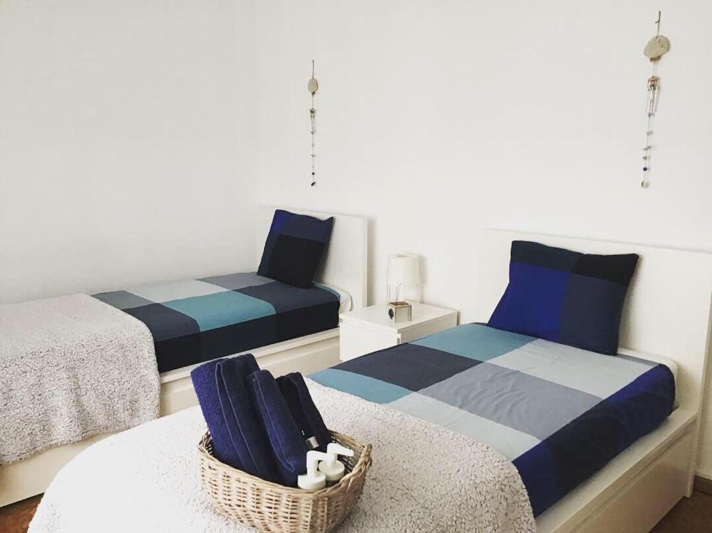 Un pat sau paturi într-o cameră la Lagos Haven Guesthouse