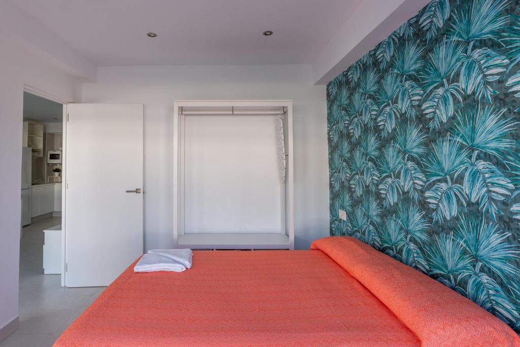 Łóżko lub łóżka w pokoju w obiekcie Mariam Mojácar Apartment