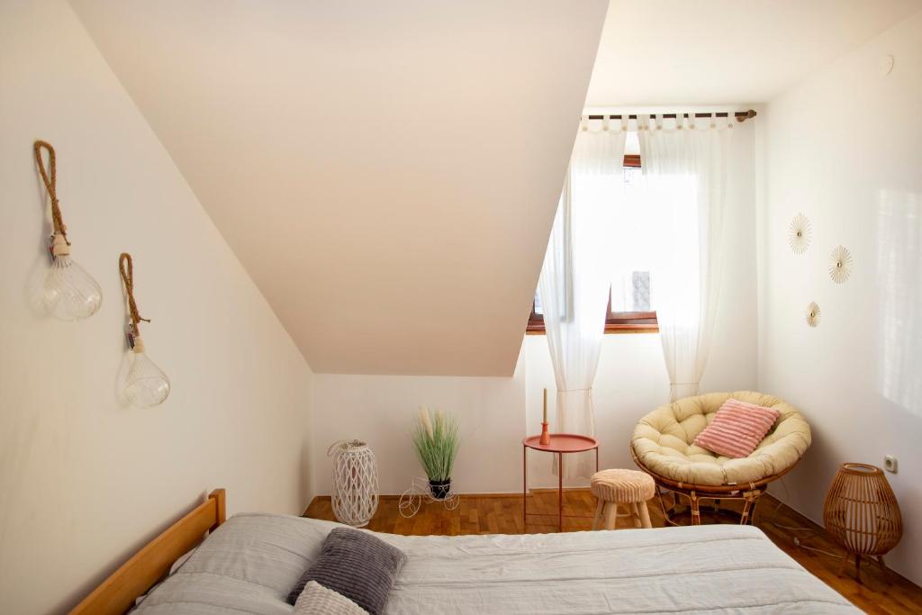 Posteľ alebo postele v izbe v ubytovaní Apartment Kika