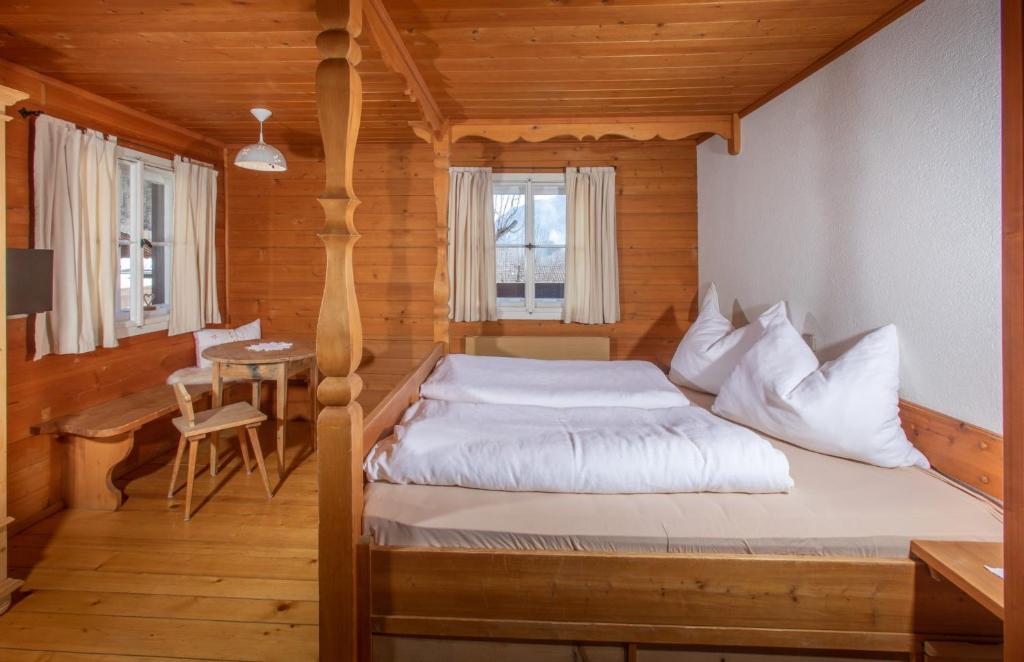 Postel nebo postele na pokoji v ubytování Bruggenwirt