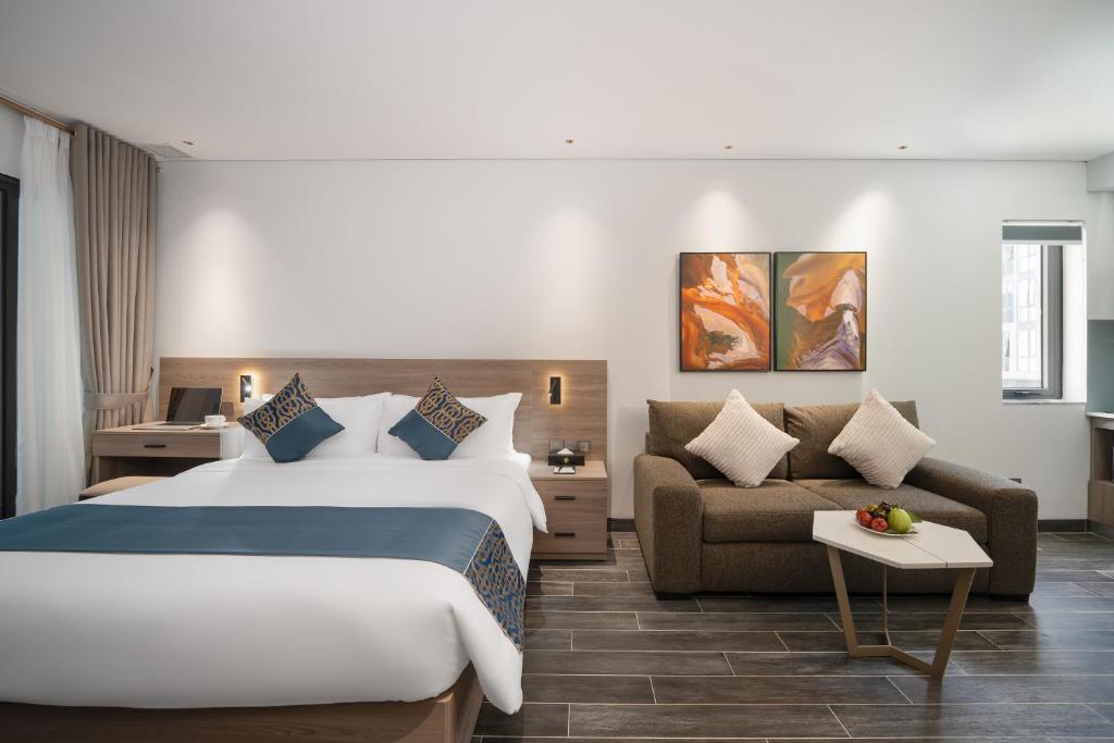 Postel nebo postele na pokoji v ubytování The Dream Suite