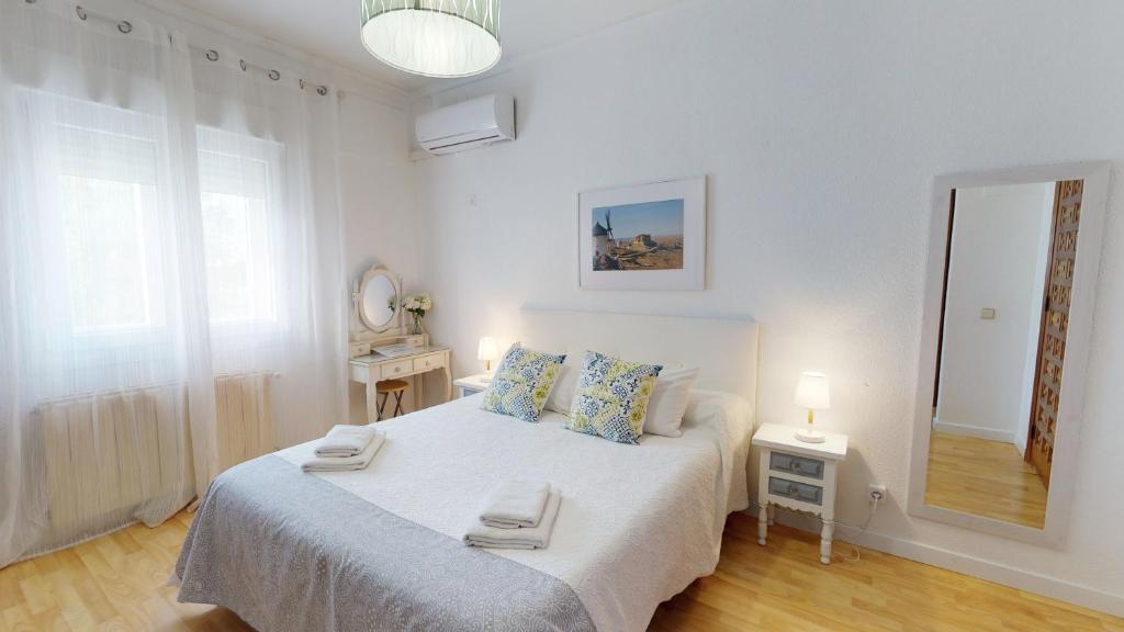 Postel nebo postele na pokoji v ubytování Hotel Consuegra