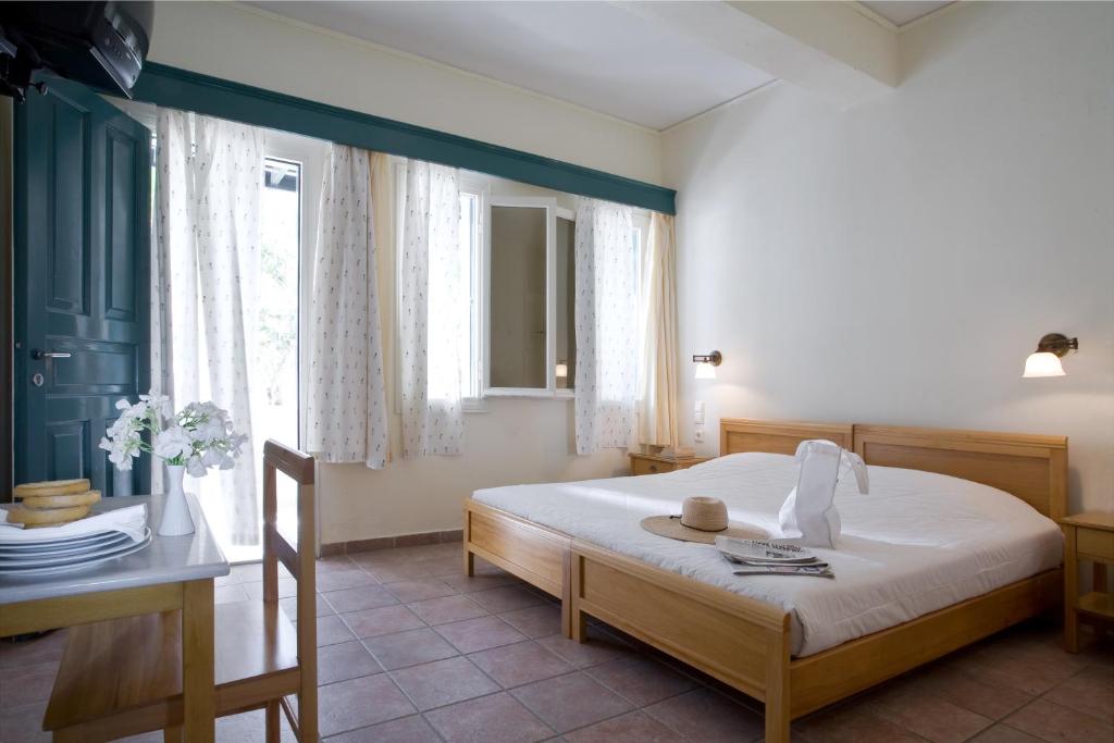 Postel nebo postele na pokoji v ubytování Rose Bay Hotel