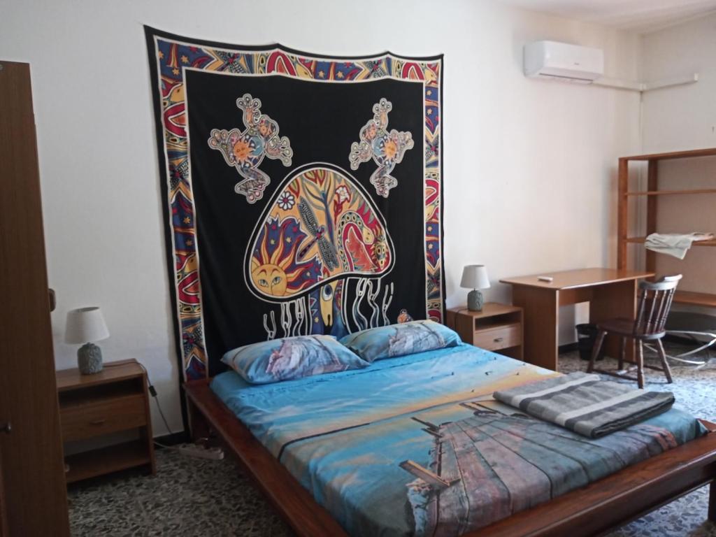 Postel nebo postele na pokoji v ubytování colors house