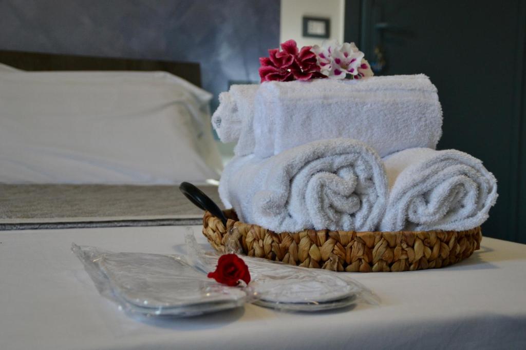 Postel nebo postele na pokoji v ubytování Sperlonga Paradise Suites 500m dal mare in estate Servizio navetta per Sperlonga centro