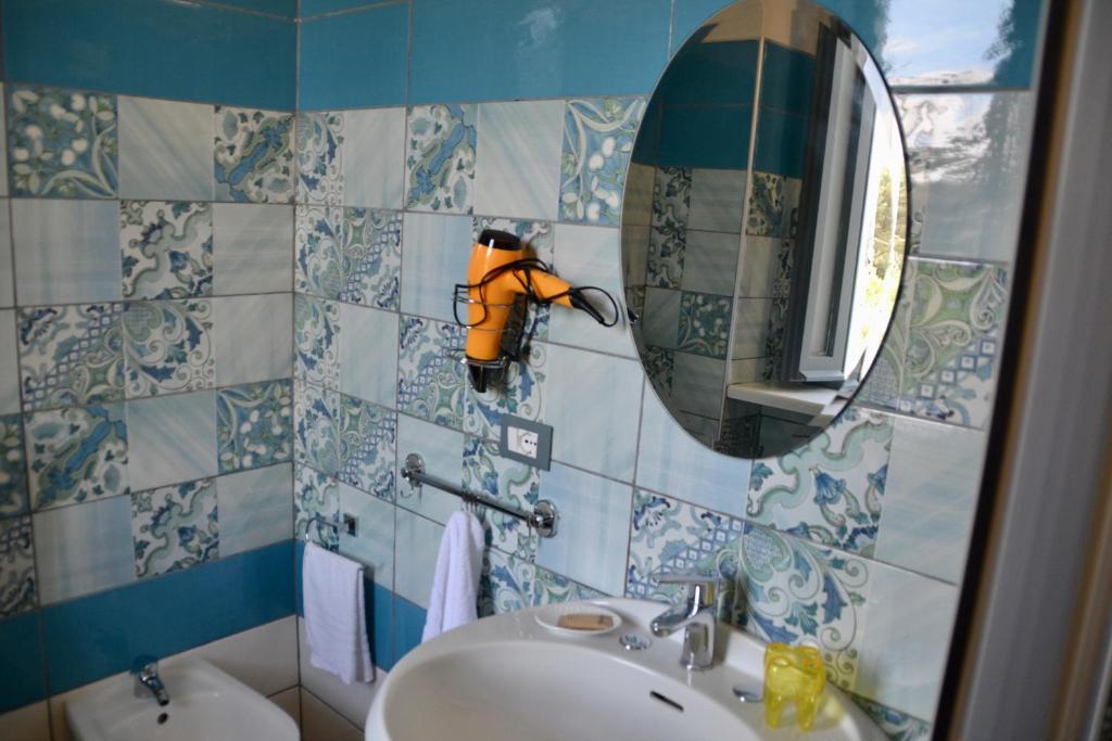 Koupelna v ubytování Sperlonga Paradise Suites 500m dal mare in estate Servizio navetta per Sperlonga centro