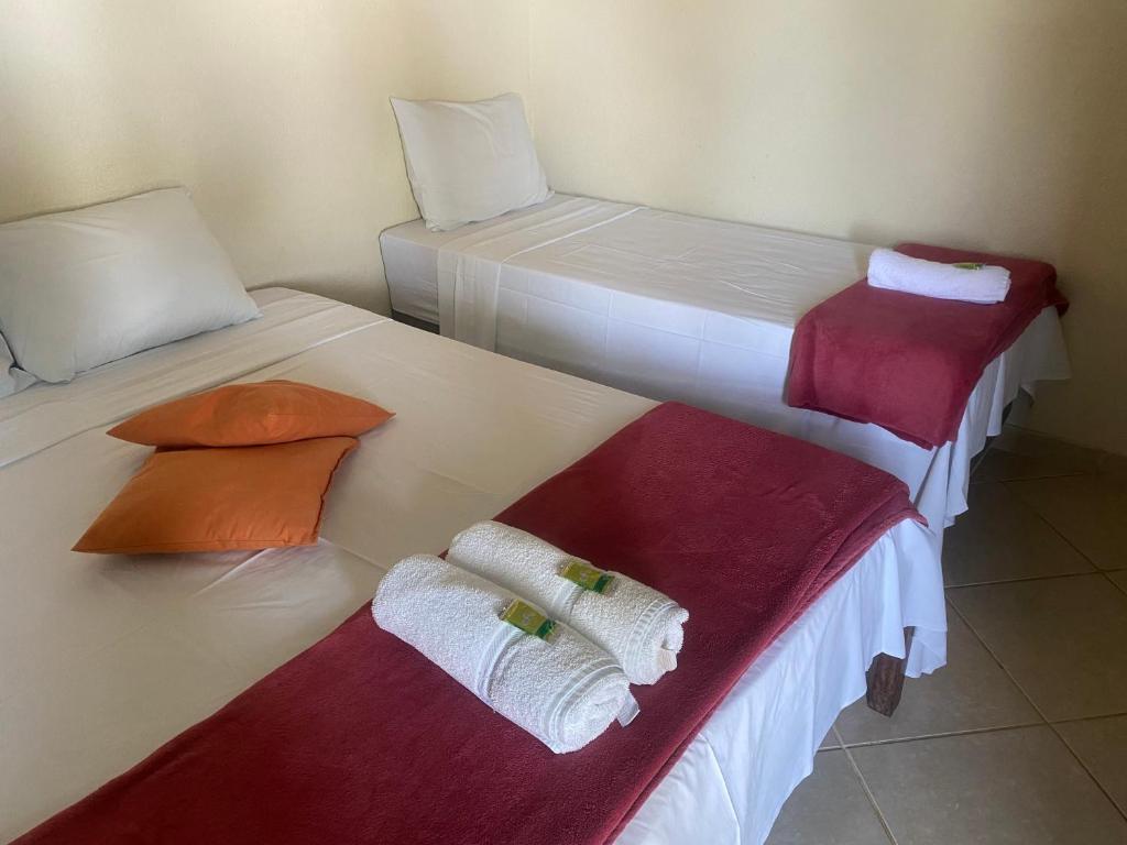 Кровать или кровати в номере Pousada Do Sol