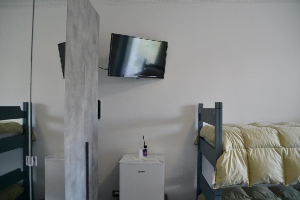 Postel nebo postele na pokoji v ubytování Sperlonga Paradise Suites 500m dal mare in estate Servizio navetta per Sperlonga centro