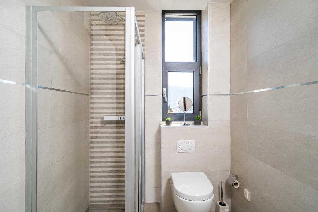 Kúpeľňa v ubytovaní Crown Apartments - Emerald 1 BD