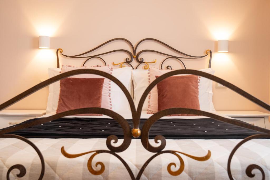 Postel nebo postele na pokoji v ubytování Il Castellaccio Bed & Breakfast