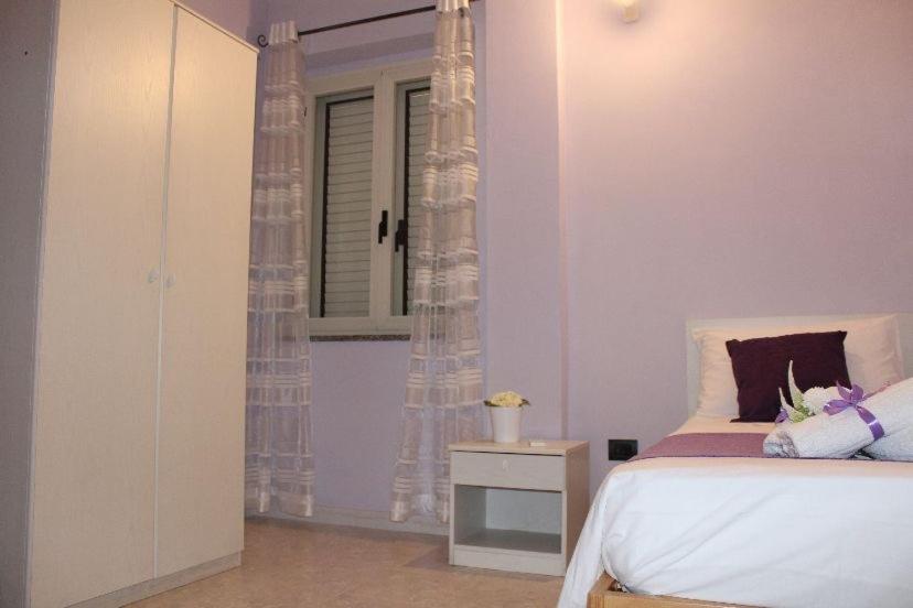 A bed or beds in a room at Casa Mary