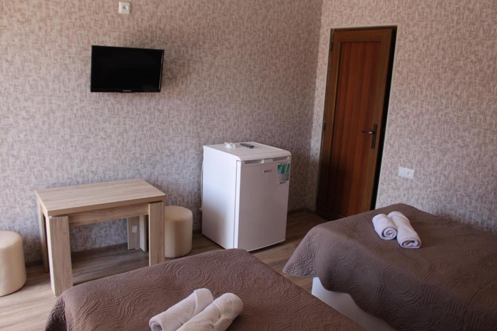 TV a/nebo společenská místnost v ubytování Hotel Rabati