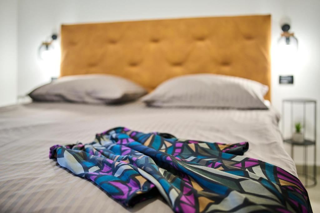 Łóżko lub łóżka w pokoju w obiekcie Apartments Dolcea