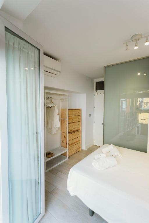 A bed or beds in a room at Empecinado