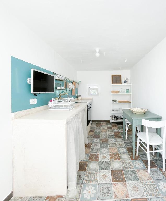 Kuchyň nebo kuchyňský kout v ubytování Trullo San Vincenzo con Piscina