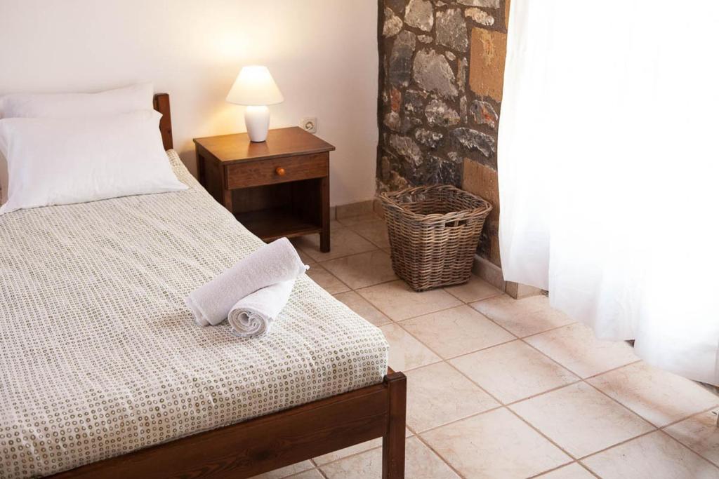 A bed or beds in a room at Io
