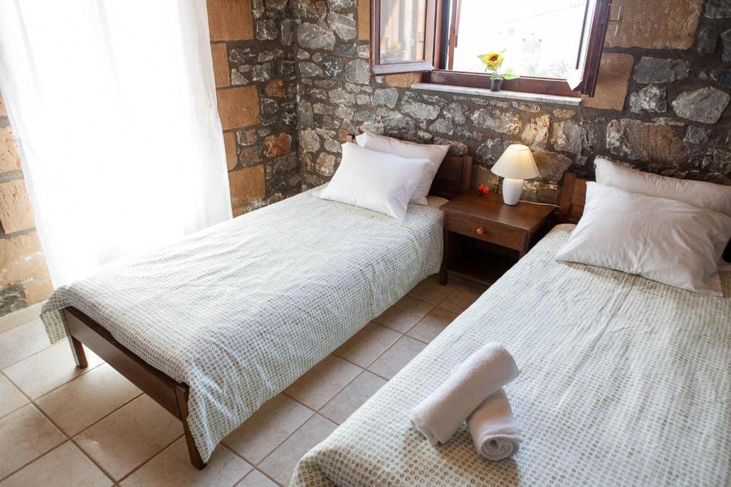 A bed or beds in a room at Io