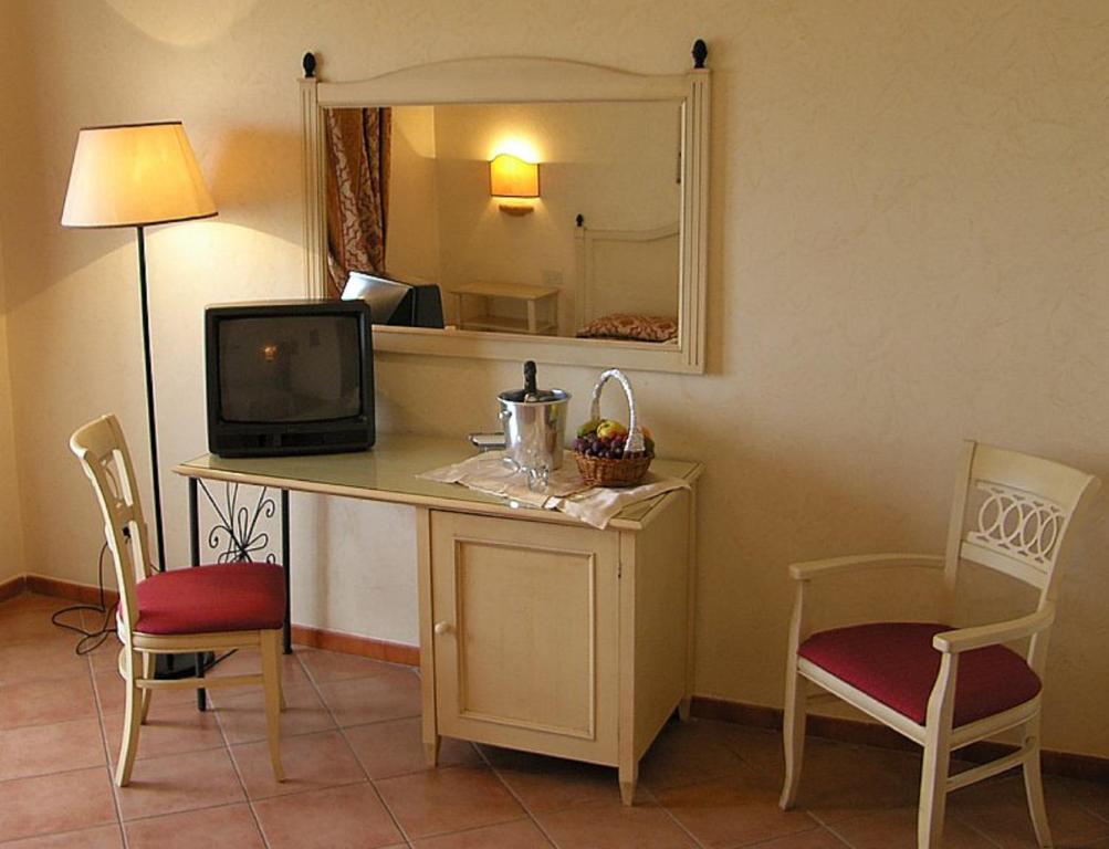 Kuchyň nebo kuchyňský kout v ubytování Hotel Santa Lucia Le Sabbie d'Oro