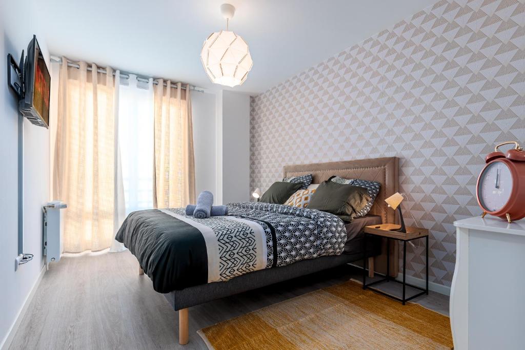 Posteľ alebo postele v izbe v ubytovaní Appartement lumineux de standing