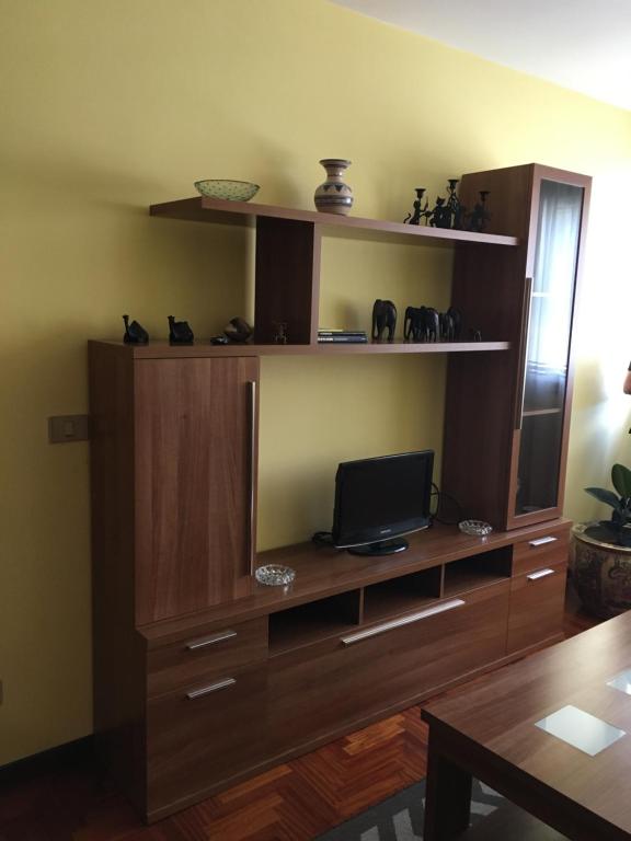 Televízia a/alebo spoločenská miestnosť v ubytovaní PASEO DO MACEIRAS