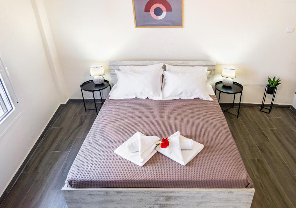 Postel nebo postele na pokoji v ubytování Casa In Centro Chania