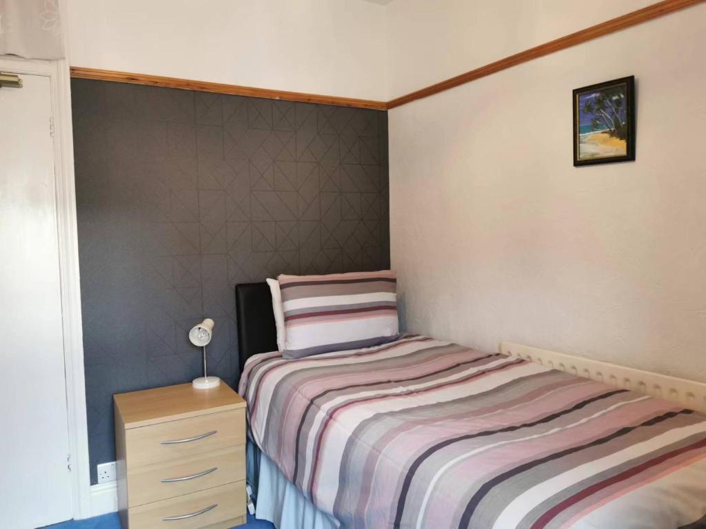 Postel nebo postele na pokoji v ubytování Athol Park Guest House