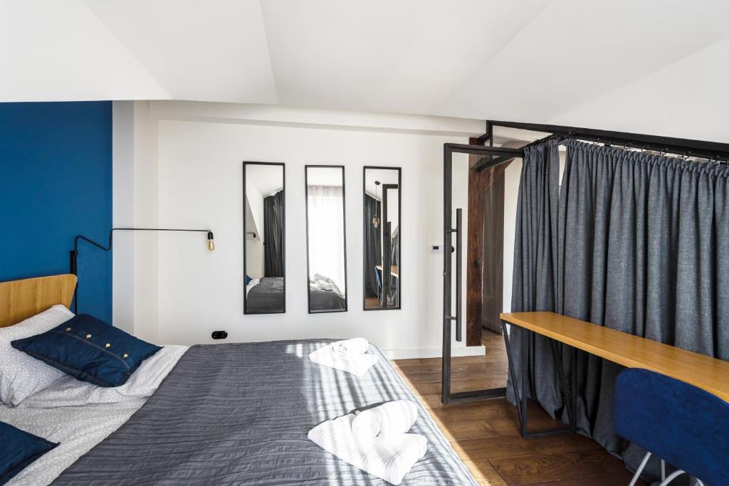 Posteľ alebo postele v izbe v ubytovaní Wegierska Luxury Loft WAWELOFTS