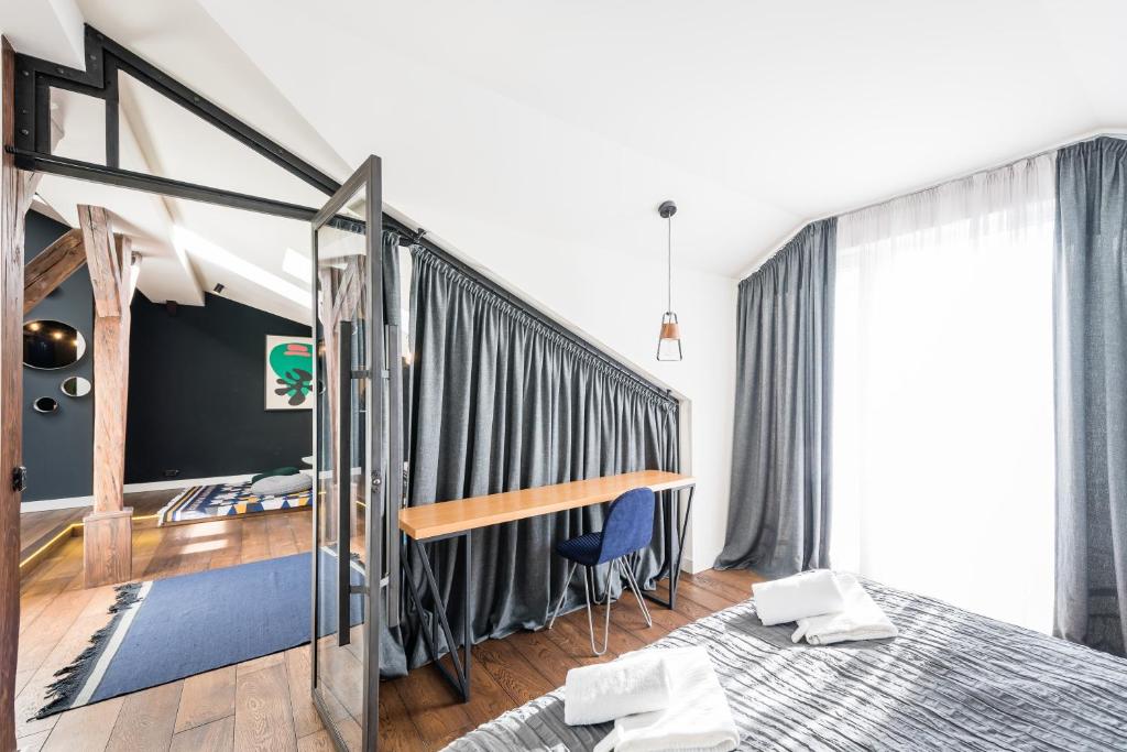 Posteľ alebo postele v izbe v ubytovaní Wegierska Luxury Loft WAWELOFTS