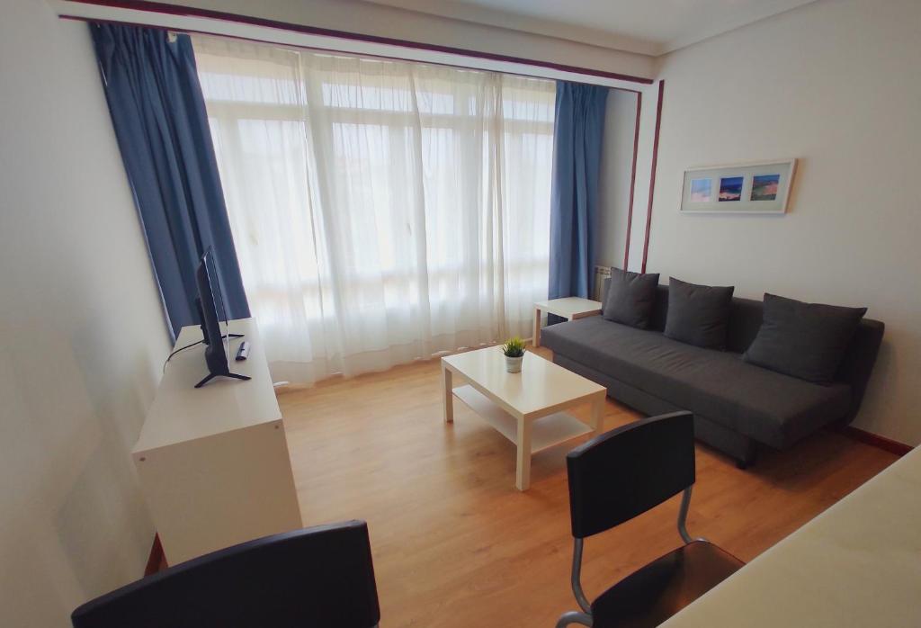 A seating area at Apartamentos El Jornu