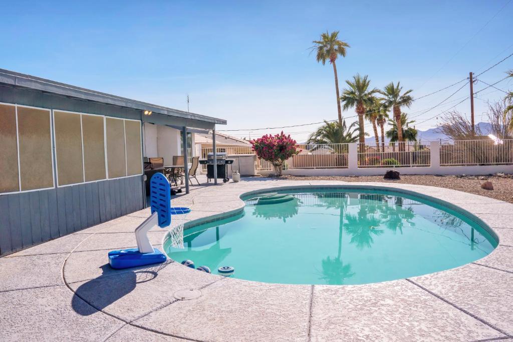 a small swimming pool in the middle of a patio at *NEW* COZY POOL HOME - HEART OF LAKE HAVASU in Lake Havasu City